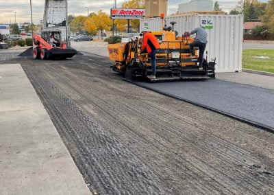 Stretch of asphalt being repaved